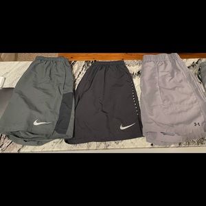2 Nike Dri Fit Running Short; 1 UnderArmour Short